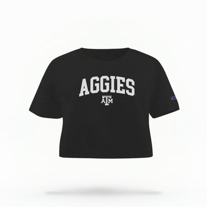 The Black Adult Womens Texas A&M Aggies Collegiate Crop Top lays flat on a white background. The ﻿Texas A&M Aggies Collegiate﻿ graphic is in bold White in a Varsity style.