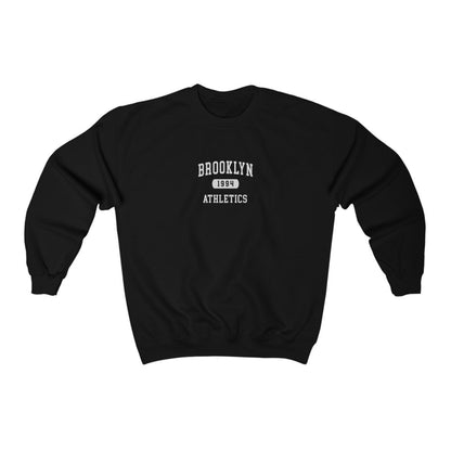 The Black Brooklyn Athletics Crewneck Sweatshirt lays flat on a white background. The ﻿Brooklyn Athletics﻿ graphic is in bold White in a Varsity style.