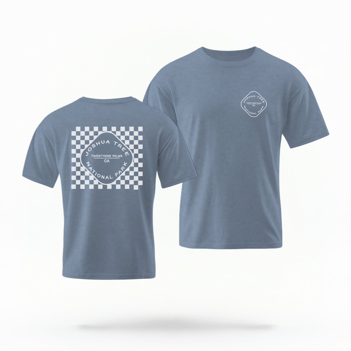 The Blue Jean Joshua Tree Retro Checkered Comfort Colors T-shirt lays flat on a white background. The ﻿Joshua Tree Retro Checkered﻿ graphic is in bold White in a Retro style.