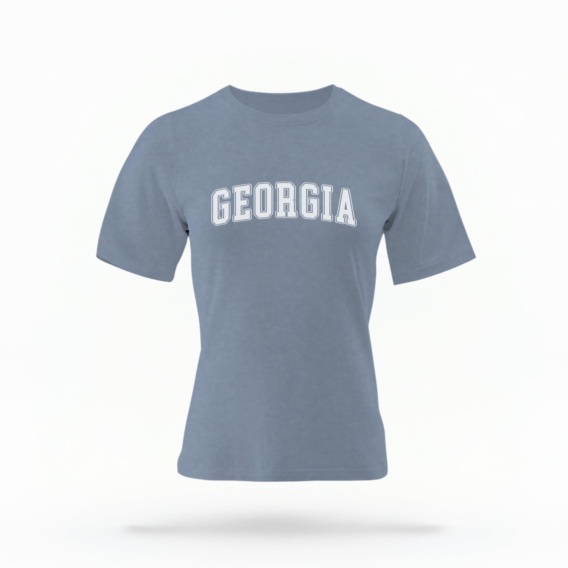 The Blue Jeans Unisex Georgia Varsity Comfort Colors T-shirt lays flat on a white background. The Georgia graphic is in bold white in a varsity offset style.
