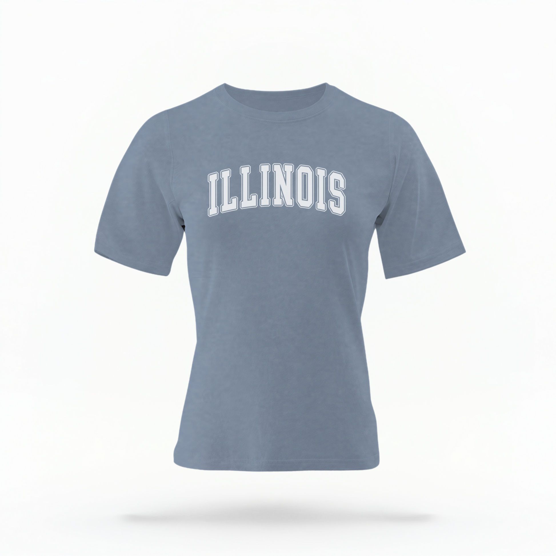 The Blue Jeans Unisex Illinois Varsity Comfort Colors T-shirt lays flat on a white background. The Illinois graphic is in bold white in a varsity offset style.