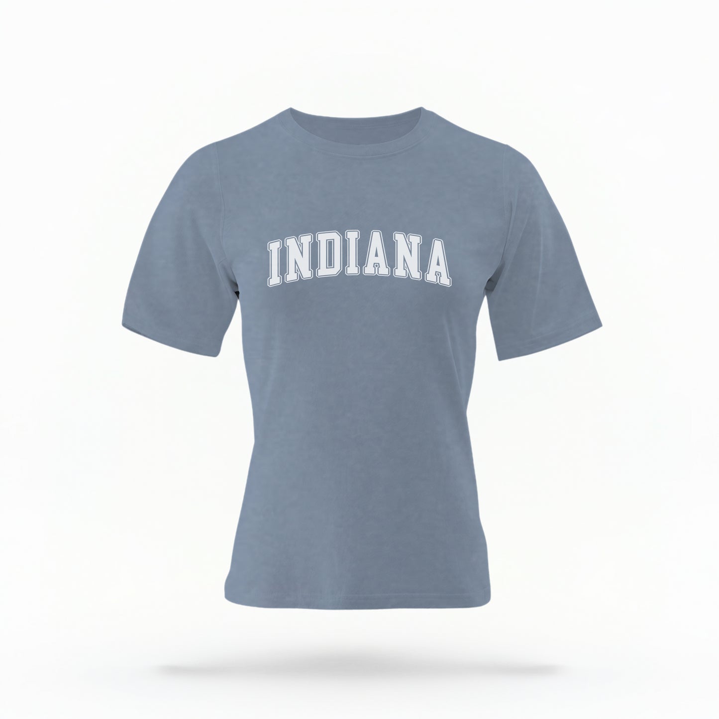 The Blue Jeans Unisex Indiana Varsity Comfort Colors T-shirt lays flat on a white background. The Indiana graphic is in bold white in a varsity offset style.