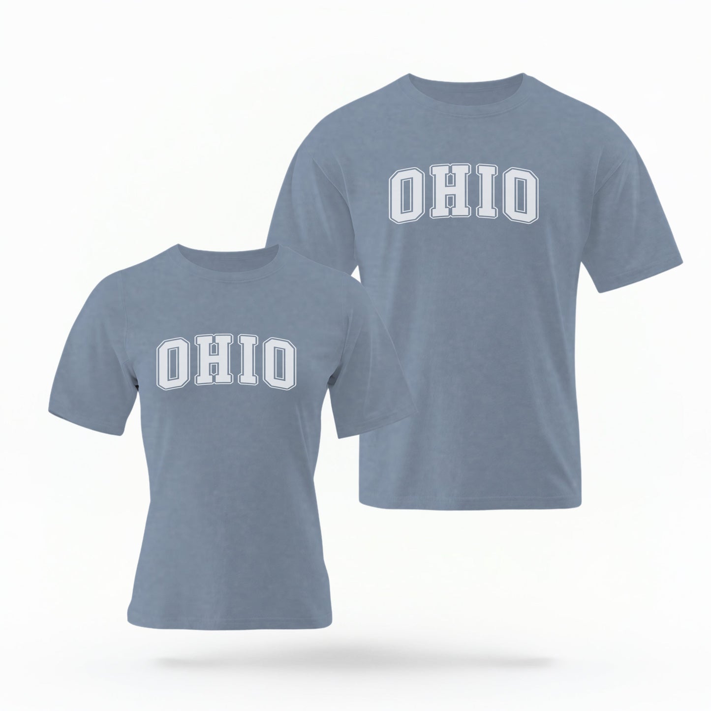 The Blue Jeans Unisex Ohio Varsity Comfort Colors T-shirt lays flat on a white background. The Ohio graphic is in bold white in a varsity offset style.