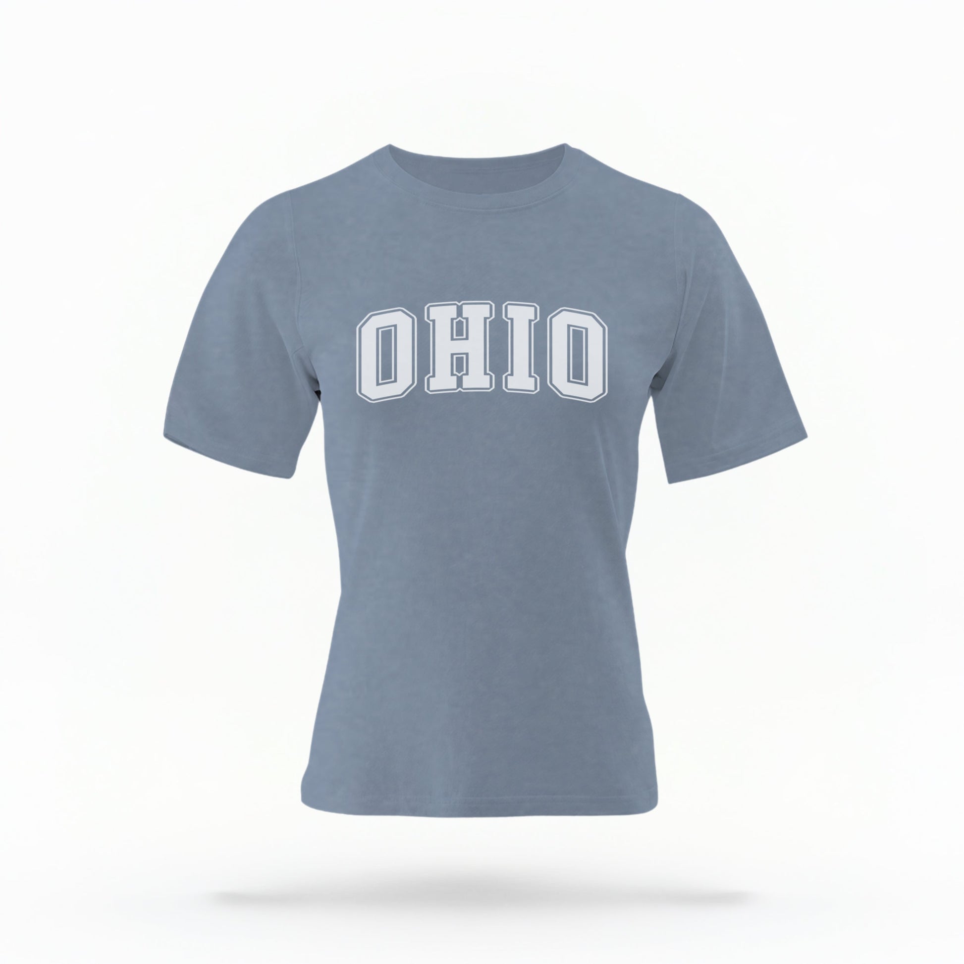 The Blue Jeans Unisex Ohio Varsity Comfort Colors T-shirt lays flat on a white background. The Ohio graphic is in bold white in a varsity offset style.