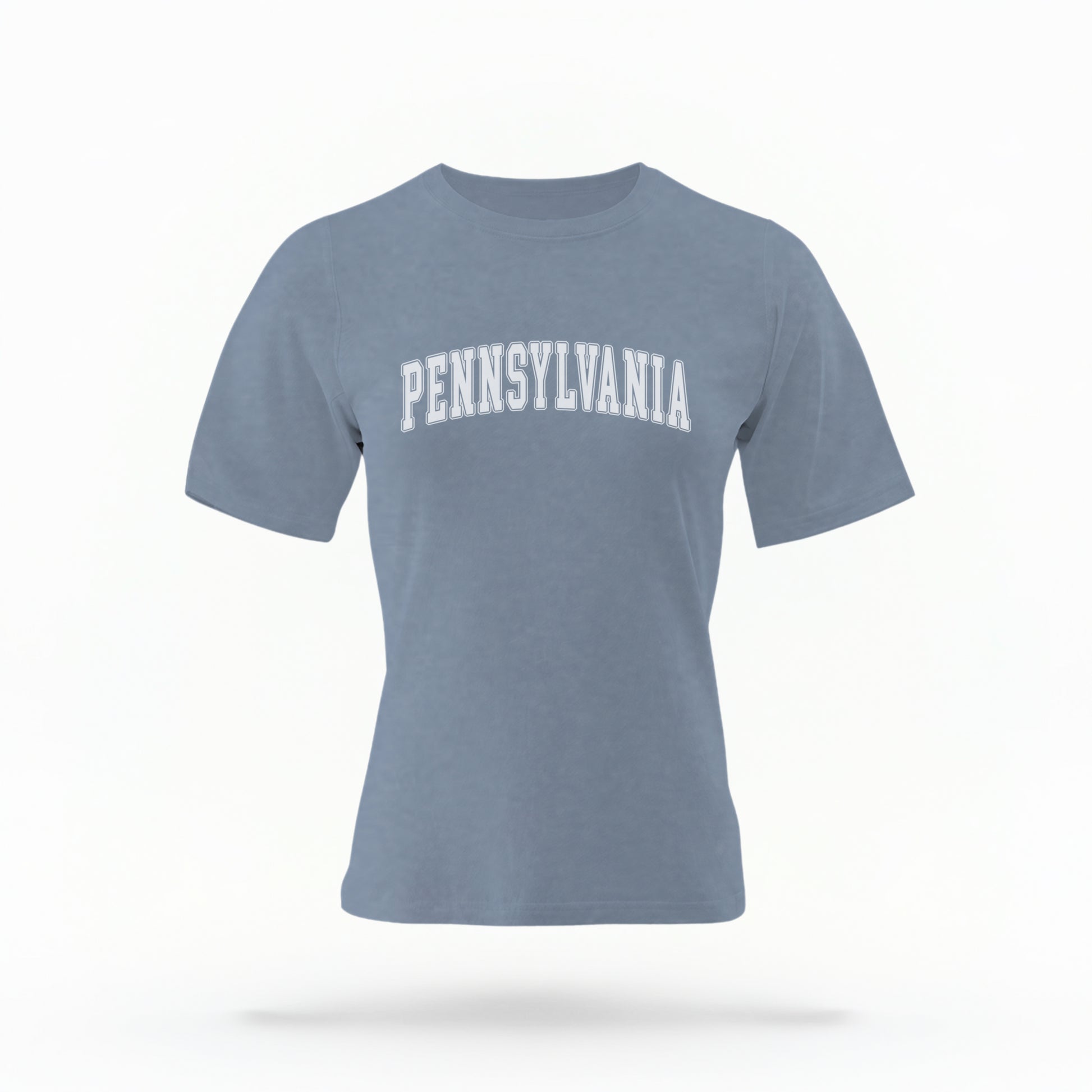 The Blue Jeans Unisex Pennsylvania Varsity Comfort Colors T-shirt lays flat on a white background. The Pennsylvania graphic is in bold white in a varsity offset style.
