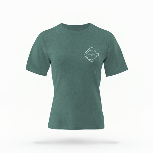 The Blue Spruce Joshua Tree Retro Checkered Comfort Colors T-shirt lays flat on a white background. The ﻿Joshua Tree Retro Checkered﻿ graphic is in bold white in a Retro style.