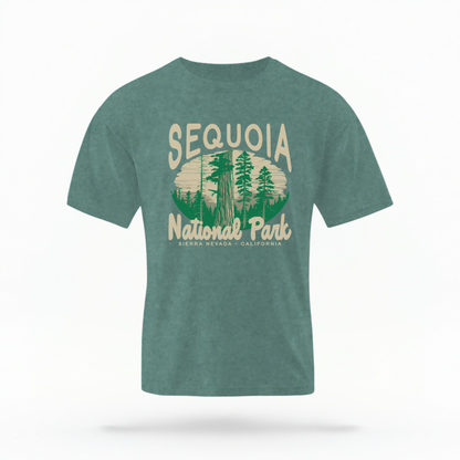 The Blue Spruce Adult Unisex Sequoia National Park Comfort Colors T-shirt lays flat on a white background. The ﻿Sequoia National Park﻿ graphic is in bold cream in a Rustic Park style.