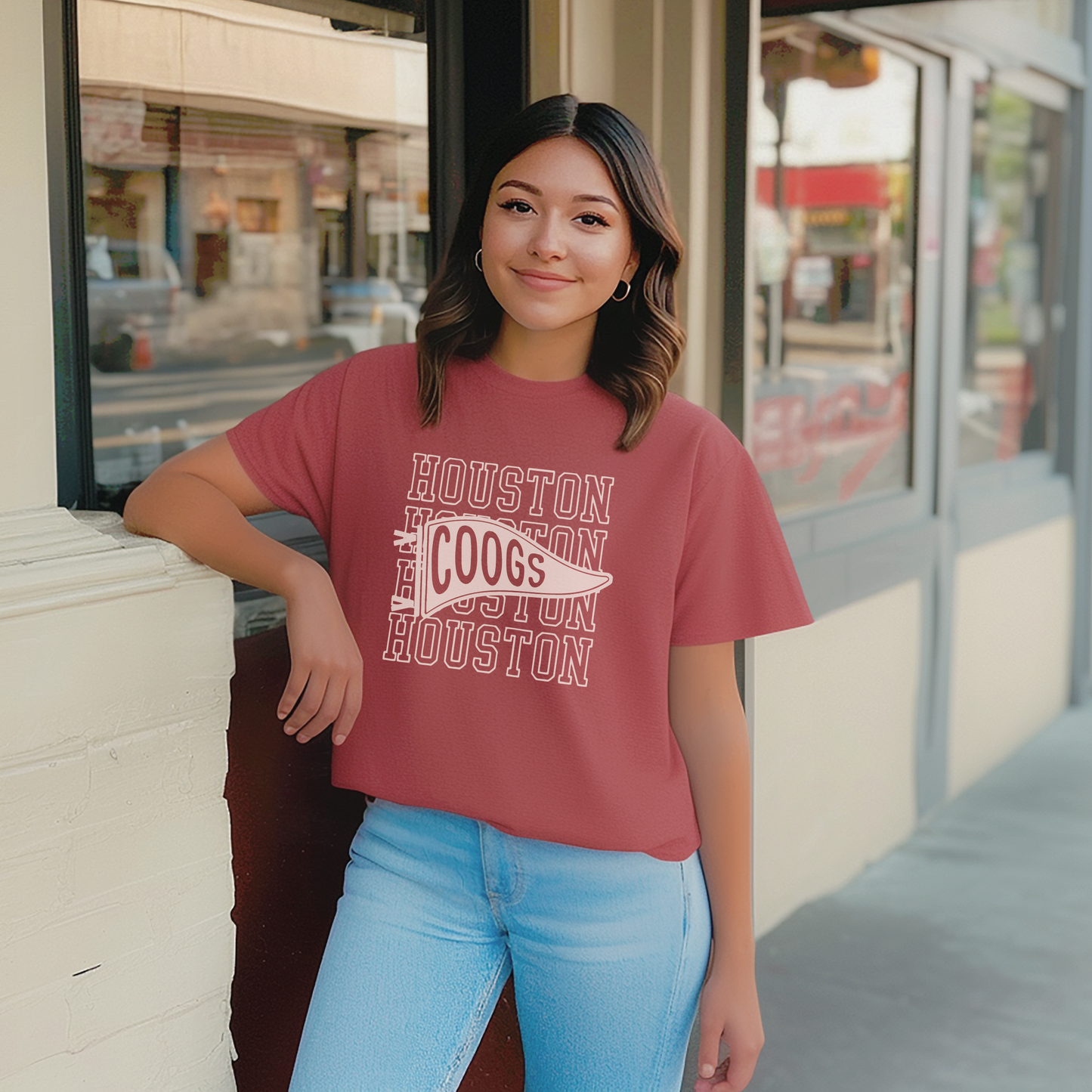 A model wears the Houston Cougars t-shirt. 