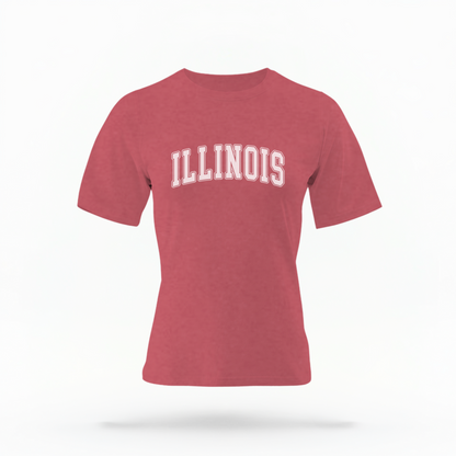 The Crimson Unisex Illinois Varsity Comfort Colors T-shirt lays flat on a white background. The Illinois graphic is in bold White in a varsity offset style.