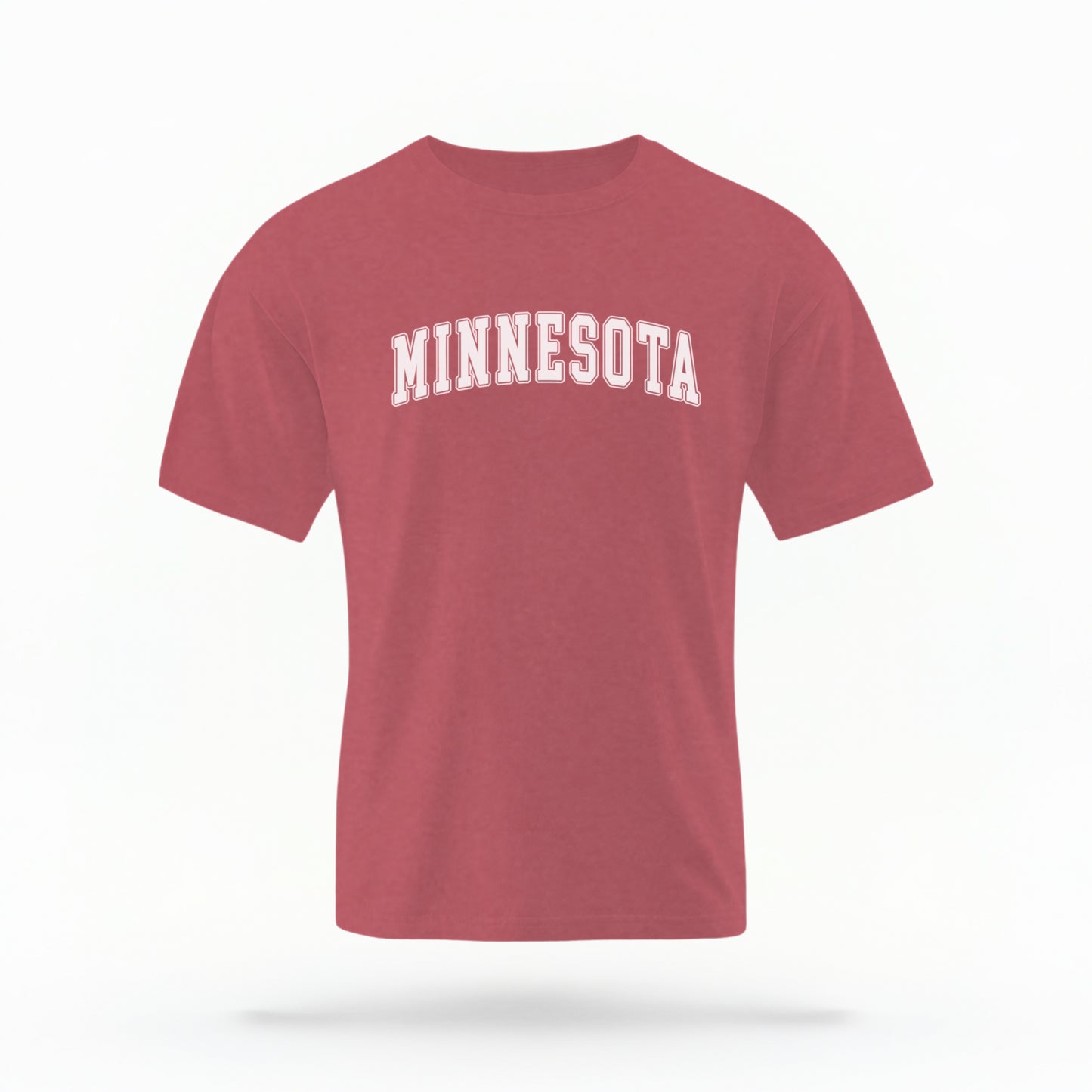 The Crimson Unisex Minnesota Varsity Comfort Colors T-shirt lays flat on a white background. The Minnesota graphic is in bold white in a varsity offset style.