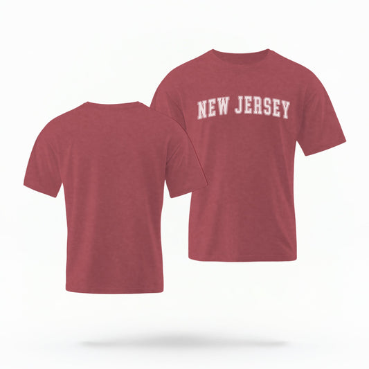 The Crimson Unisex New Jersey Varsity Comfort Colors T-shirt lays flat on a white background. The New Jersey graphic is in bold white in a varsity offset style.