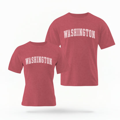 The Crimson Unisex Washington Varsity Comfort Colors T-shirt lays flat on a white background. The Washington graphic is in bold white in a varsity offset style.