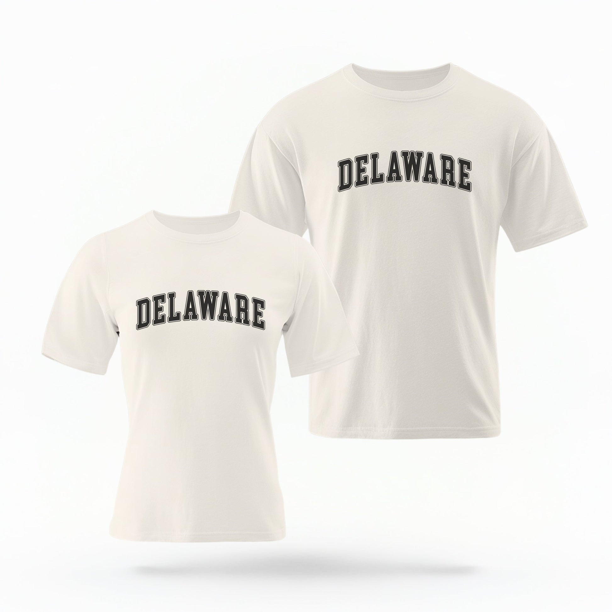 The ivory Unisex Delaware Varsity Comfort Colors T-shirt lays flat on a white background. The Delaware graphic is in bold black in a varsity offset style.