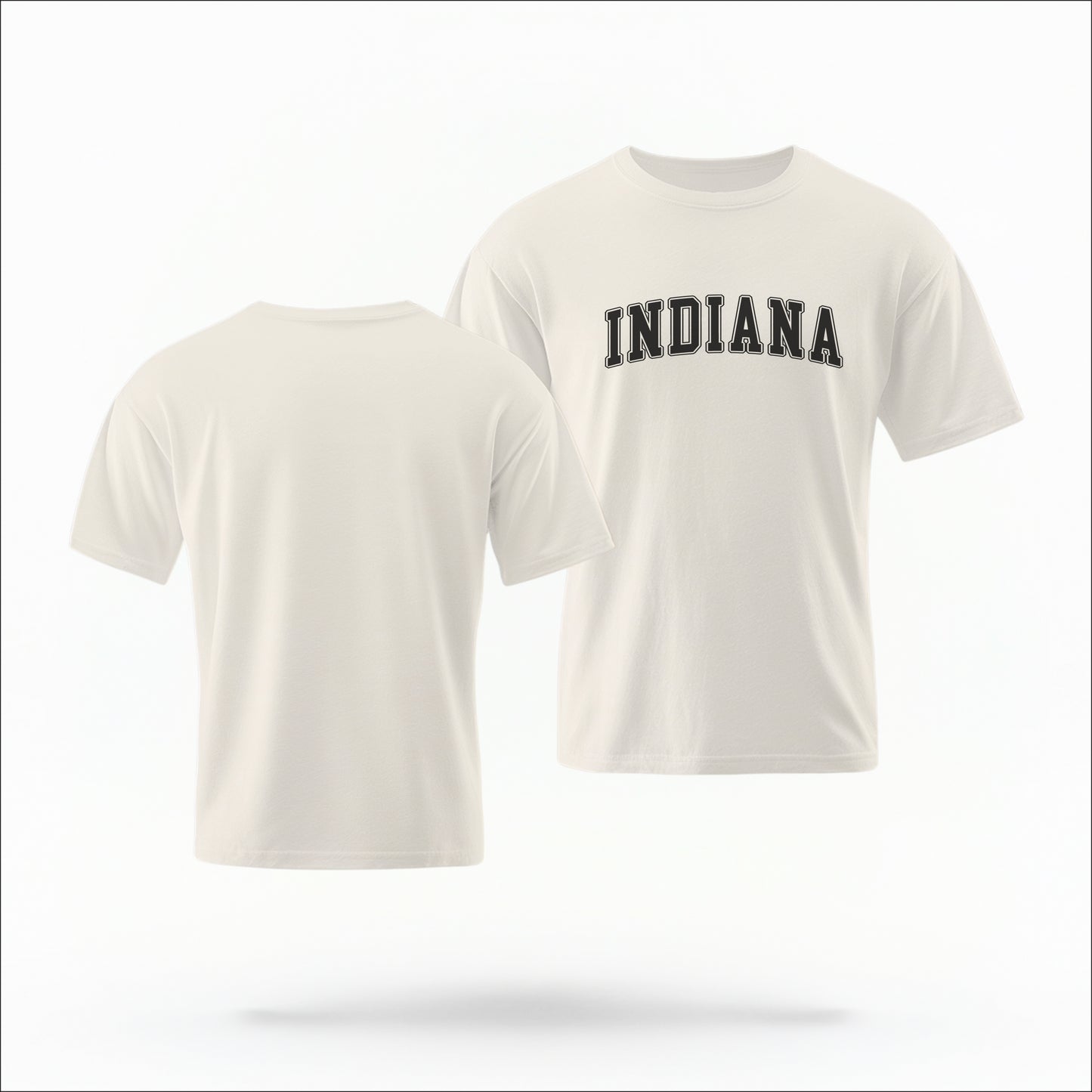 The ivory Unisex Indiana Varsity Comfort Colors T-shirt lays flat on a white background. The Indiana graphic is in bold black in a varsity offset style.