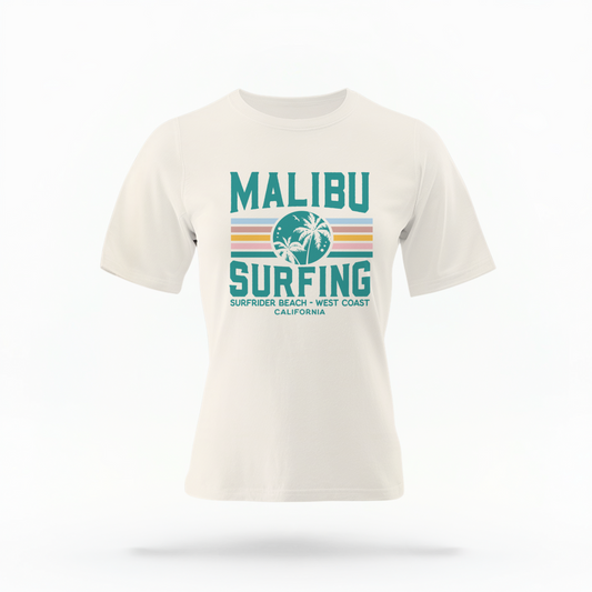 The Ivory Adult Unisex Malibu California Surfing Comfort Colors T-shirt lays flat on a white background. The ﻿Malibu California Surfing﻿ graphic is in bold Lifestyle in a Multicolor style.