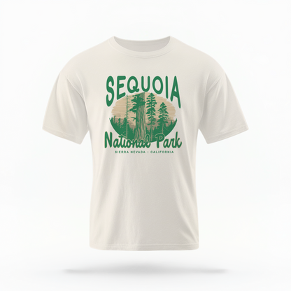 The Ivory Adult Unisex Sequoia National Park Comfort Colors T-shirt lays flat on a white background. The ﻿Sequoia National Park﻿ graphic is in bold green in a Rustic Park style.