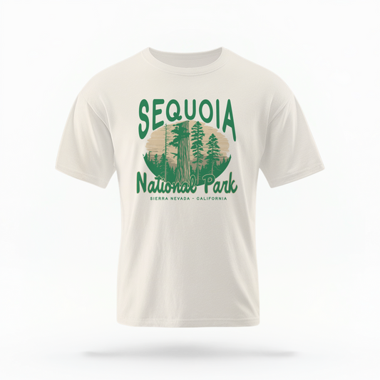 The Ivory Adult Unisex Sequoia National Park Comfort Colors T-shirt lays flat on a white background. The ﻿Sequoia National Park﻿ graphic is in bold green in a Rustic Park style.