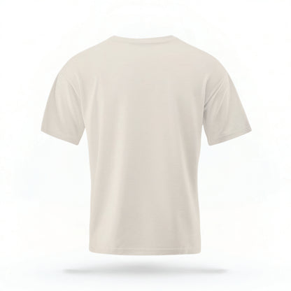 The Ivory Adult Unisex Georgia Peach Social Club T-shirt stands against a white background.  The Georgia Peach  graphic is in bold orange and green in a  preppy old money style. 