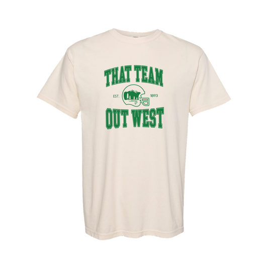 The Ivory 'That team out west' Tshirt lays flat on a white background. The graphic is in bold green in a collegiate style.