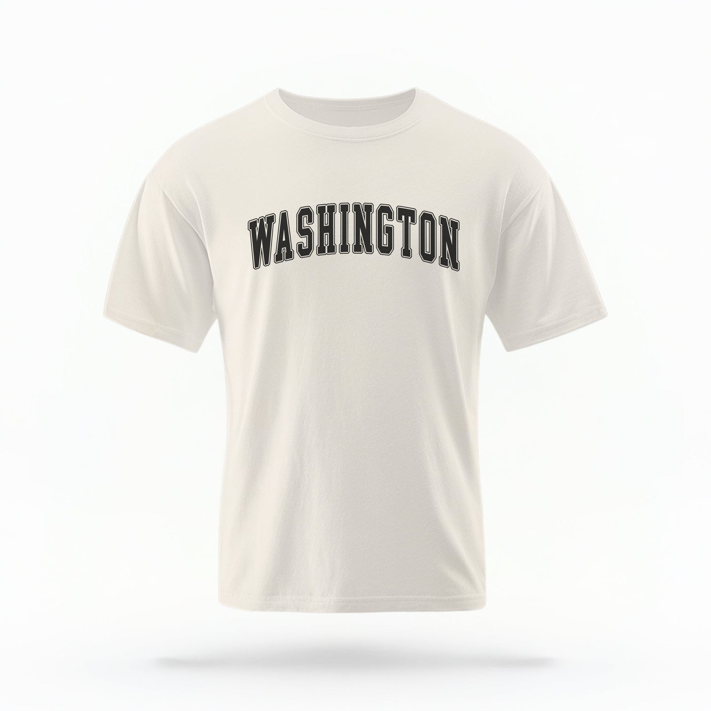 The ivory Unisex Washington Varsity Comfort Colors T-shirt lays flat on a white background. The Washington graphic is in bold black in a varsity offset style.