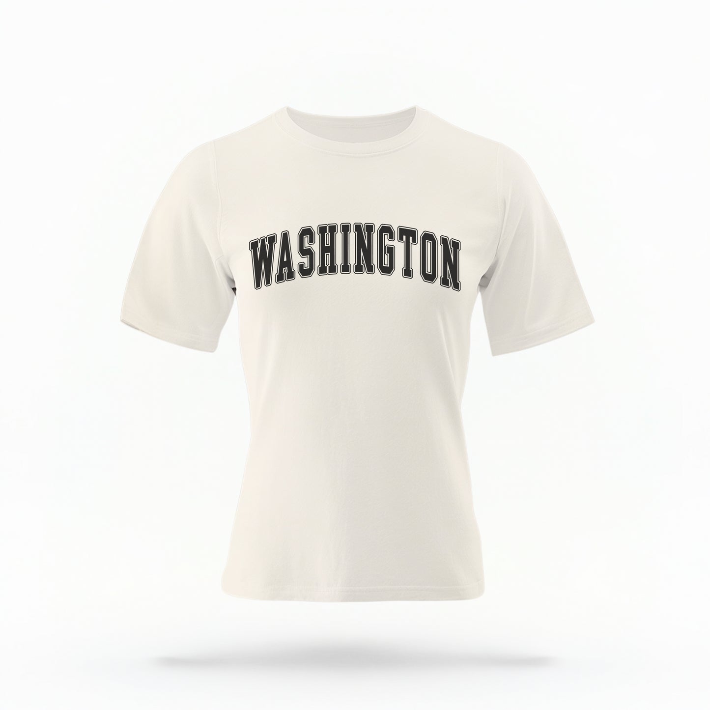 The ivory Unisex Washington Varsity Comfort Colors T-shirt lays flat on a white background. The Washington graphic is in bold black in a varsity offset style.