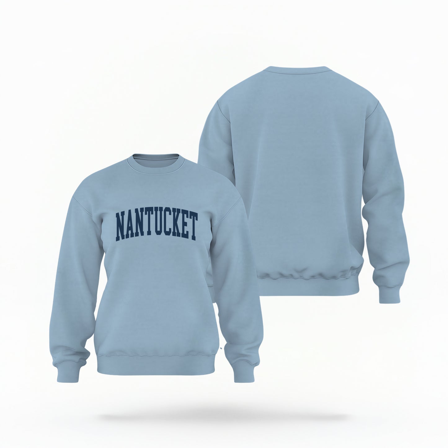 The Light Blue Unisex Nantucket Varsity Crewneck Sweatshirt lays flat on a white background. The Nantucket graphic is in bold navy and varsity offset style.