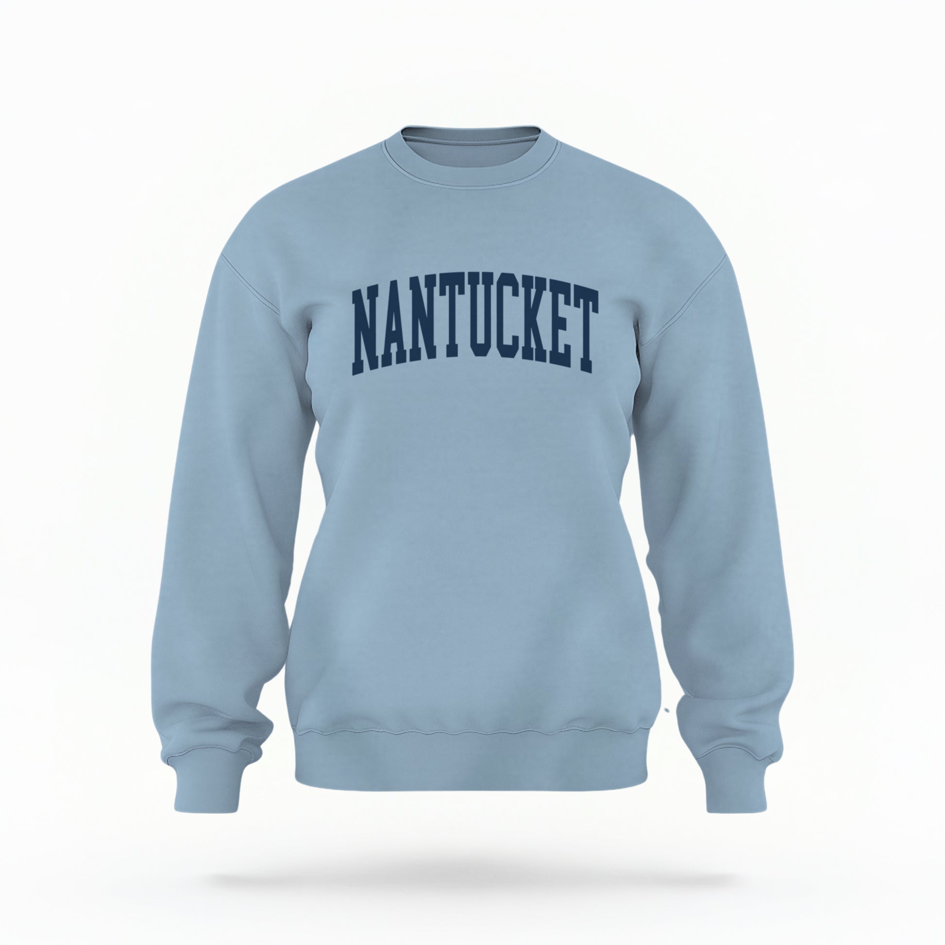 The Light Blue Unisex Nantucket Varsity Crewneck Sweatshirt lays flat on a white background. The Nantucket graphic is in bold navy and varsity offset style.