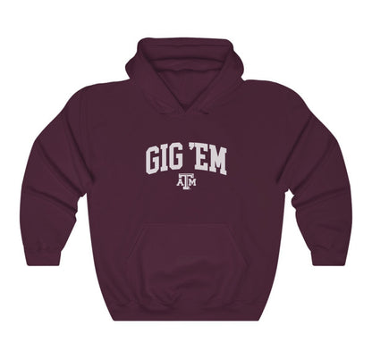 The Maroon Adult Unisex Texas A&M Gig 'Em Collegiate Hooded Sweatshirt lays flat on a white background. The ﻿Texas A&M Gig 'Em Collegiate﻿ graphic is in bold White in a Collegiate style.