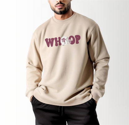 A model wears the Sand Adult Unisex Texas A&M Retro Whoop Crewneck Sweatshirt.  The ﻿Texas A&M Retro Whoop﻿ graphic is in bold Black in a Vintage style.