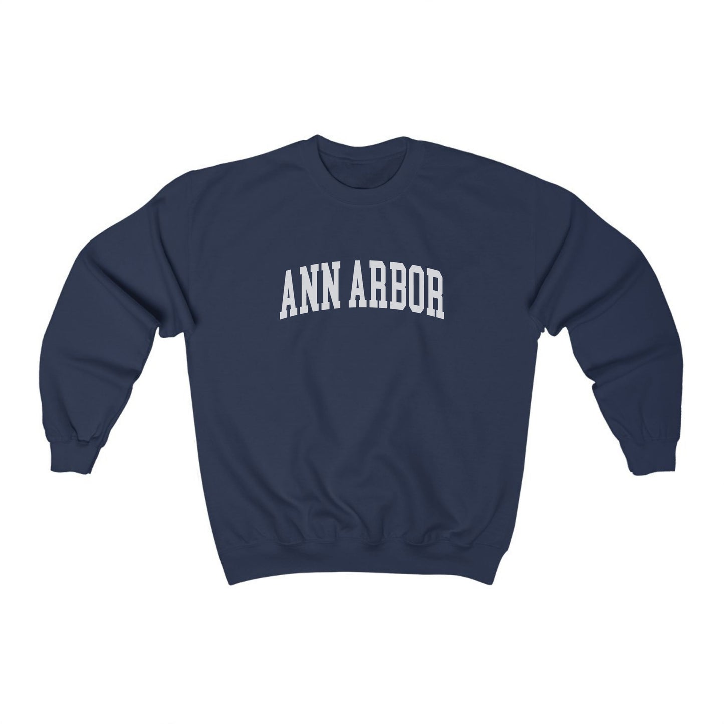 The Navy Adult Unisex Ann Arbor Michigan Varsity Crewneck Sweatshirt lays flat on a white background. The Ann Arbor Michigan Varsity graphic is in bold White in a Collegiate style.