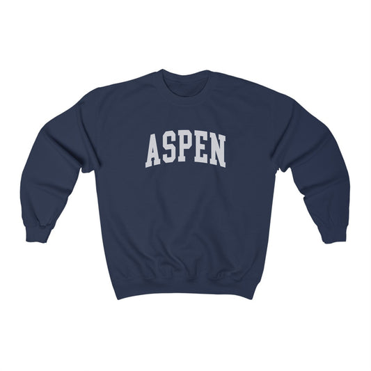 The Navy Aspen Colorado Varsity Crewneck Sweatshirt lays flat on a white background. The ﻿Aspen Colorado Varsity﻿ graphic is in bold White in a Collegiate style.