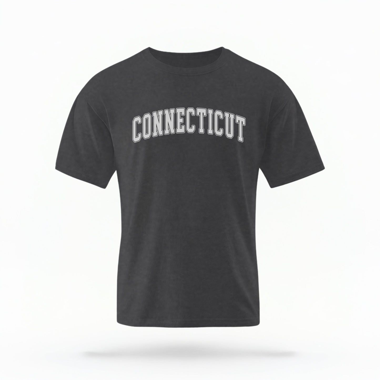 The Pepper Unisex Connecticut Varsity Comfort Colors T-shirt lays flat on a white background. The Connecticut graphic is in bold white in a varsity offset style.