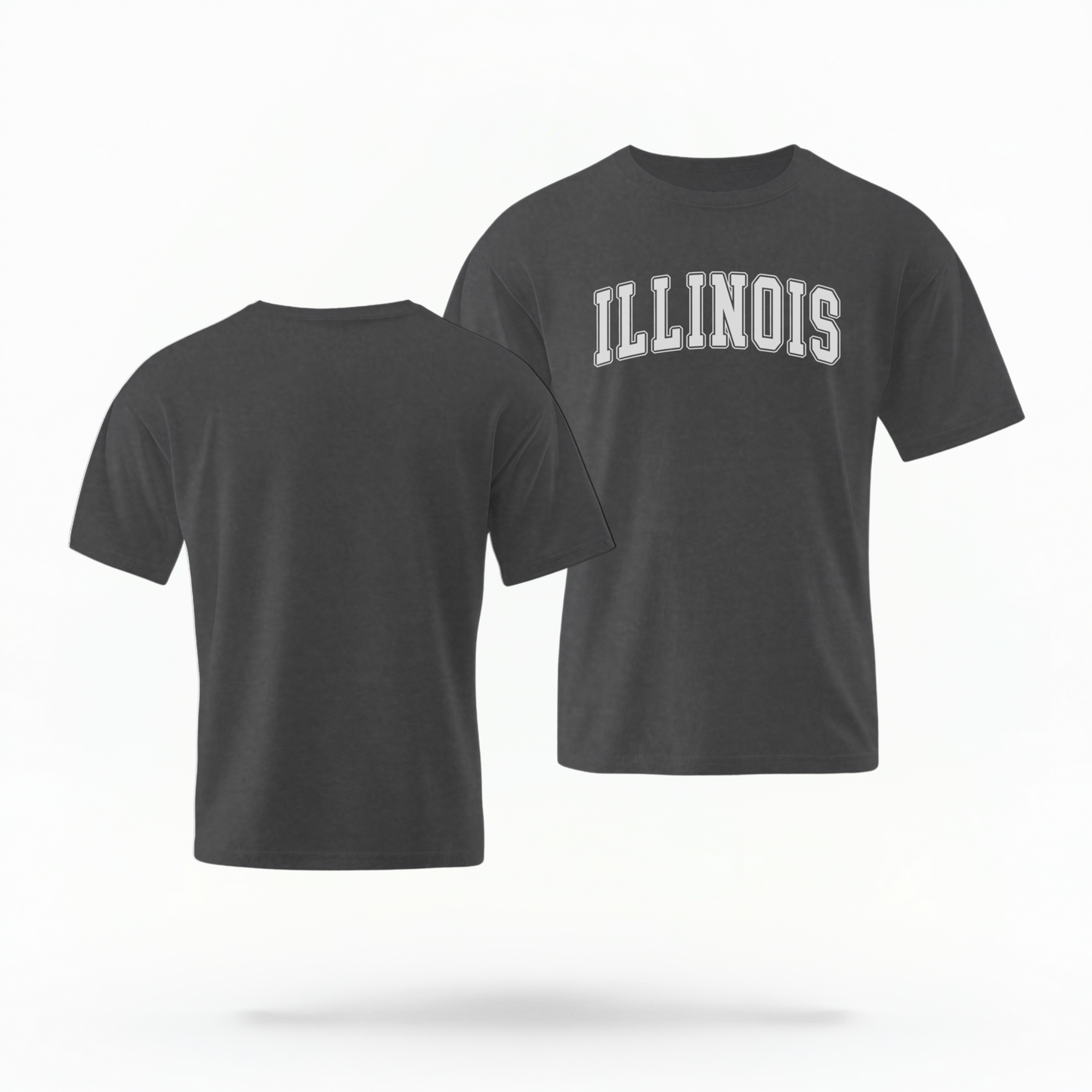 The Pepper Unisex Illinois Varsity Comfort Colors T-shirt lays flat on a white background. The Illinois graphic is in bold white in a varsity offset style.