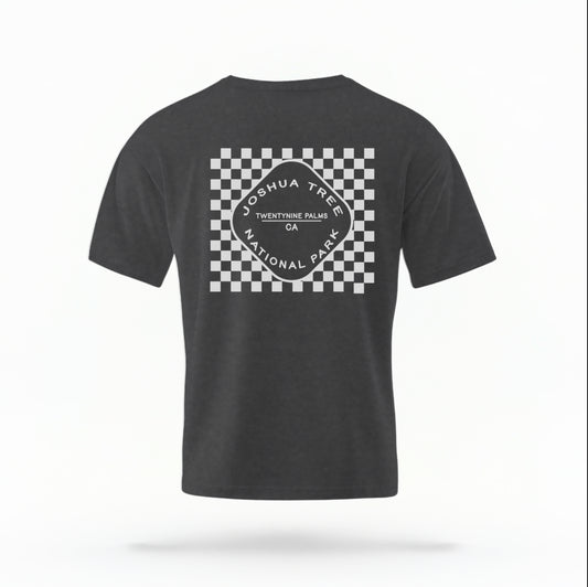 The Pepper Joshua Tree Retro Checkered Comfort Colors T-shirt lays flat on a white background. The ﻿Joshua Tree Retro Checkered﻿ graphic is in bold White in a Retro style.