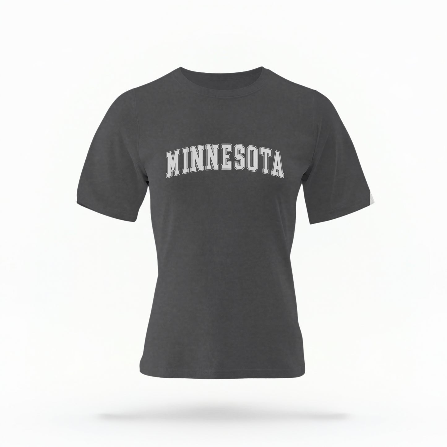 The Pepper Unisex Minnesota Varsity Comfort Colors T-shirt lays flat on a white background. The Minnesota graphic is in bold white in a varsity offset style.
