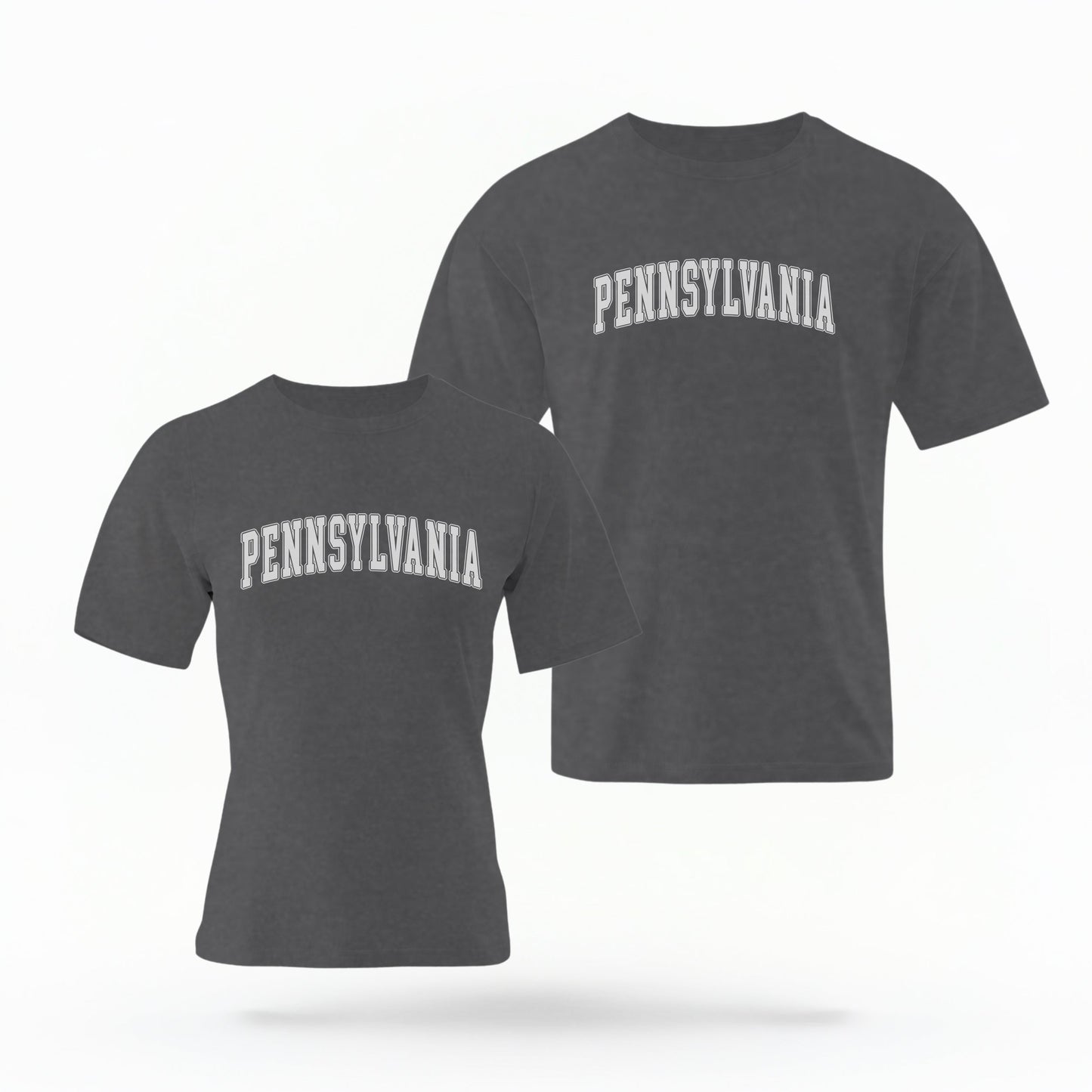 The Pepper Unisex Pennsylvania Varsity Comfort Colors T-shirt lays flat on a white background. The Pennsylvania graphic is in bold white in a varsity offset style.