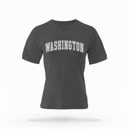 The Pepper Unisex Washington Varsity Comfort Colors T-shirt lays flat on a white background. The Washington graphic is in bold white in a varsity offset style.