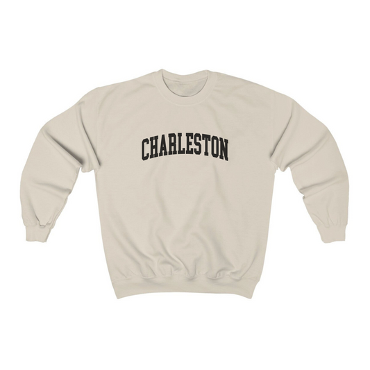 The Sand Adult Unisex Charleston SC Collegiate Crewneck Sweatshirt lays flat on a white background. The ﻿Charleston SC Collegiate﻿ graphic is in bold Black in a Varsity style.