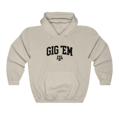 The Sand Adult Unisex Texas A&M Gig 'Em Collegiate Hooded Sweatshirt lays flat on a white background. The ﻿Texas A&M Gig 'Em Collegiate﻿ graphic is in bold Black in a Collegiate style.