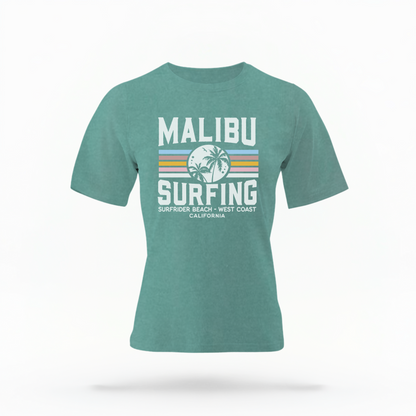 The Seafoam Adult Unisex Malibu California Surfing Comfort Colors T-shirt lays flat on a white background. The ﻿Malibu California Surfing﻿ graphic is in bold Lifestyle in a Multicolor style.