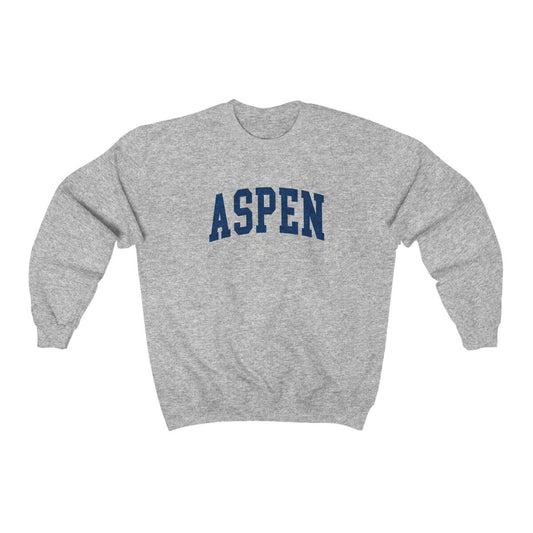 The Sport Grey Aspen Colorado Varsity Crewneck Sweatshirt lays flat on a white background. The ﻿Aspen Colorado Varsity﻿ graphic is in bold Navy in a Collegiate style.