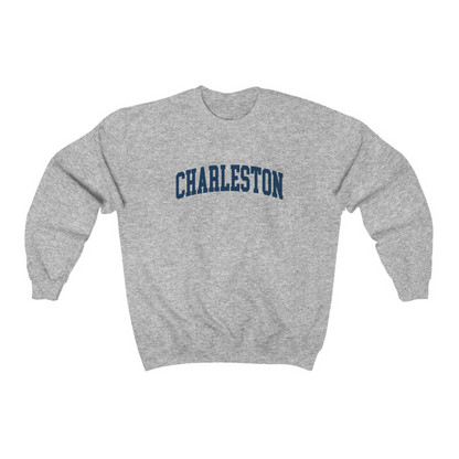 The Sport Grey Adult Unisex Charleston SC Collegiate Crewneck Sweatshirt lays flat on a white background. The ﻿Charleston SC Collegiate﻿ graphic is in bold Navy in a Varsity style.