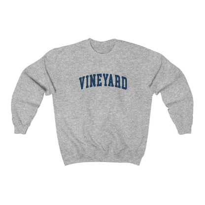 The Sport Grey Adult Unisex Martha's Vineyard Massachusetts Classic Crewneck Sweatshirt lays flat on a white background. The ﻿Martha's Vineyard Massachusetts Classic﻿ graphic is in bold Navy in a Varsity style.