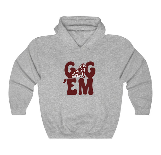 The Sport Grey Adult Unisex Texas A&M Gig 'Em Retro Reveille Hooded Sweatshirt lays flat on a white background. The ﻿Texas A&M Gig 'Em Retro Reveille﻿ graphic is in bold Maroon in a Groovy Vintage style.