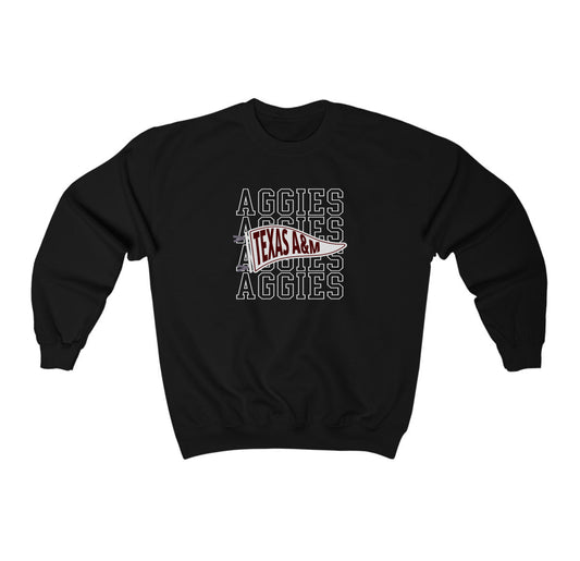 The Black Adult Unisex Texas A&M Aggies Pennant Crewneck Sweatshirt lays flat on a white background. The ﻿Texas A&M Aggies Pennant﻿ graphic is in bold White in a Varsity style.