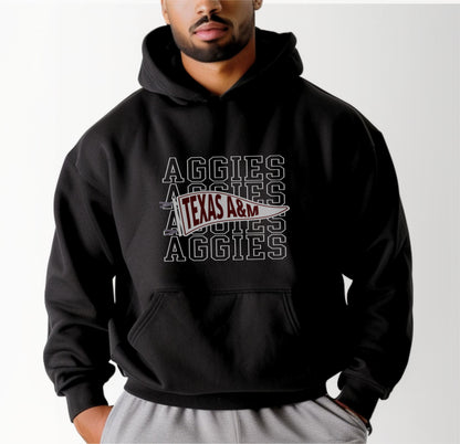 A model wears the Black Adult Unisex Texas A&M Aggies Pennant Hooded Sweatshirt.  The ﻿Texas A&M Aggies Pennant﻿ graphic is in bold Black in a Varsity style.