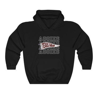 The Black Adult Unisex Texas A&M Aggies Pennant Hooded Sweatshirt lays flat on a white background. The ﻿Texas A&M Aggies Pennant﻿ graphic is in bold Black in a Varsity style.