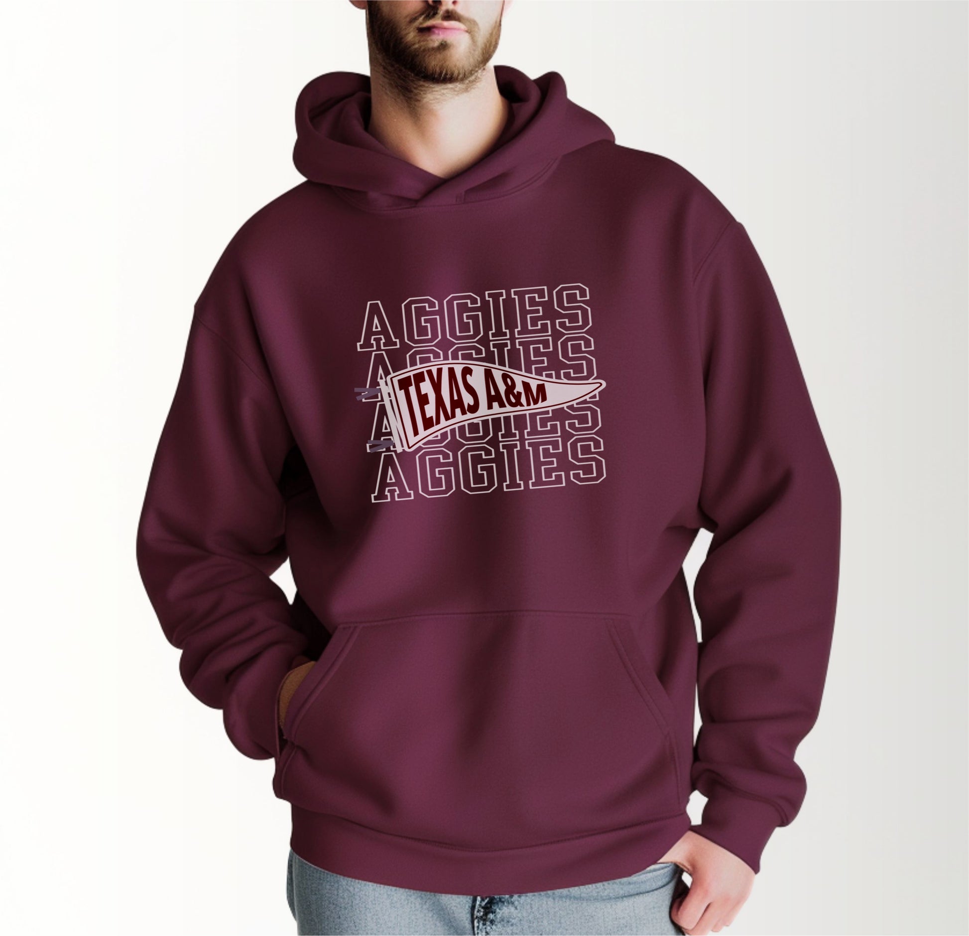 A model wears the Maroon Adult Unisex Texas A&M Aggies Pennant Hooded Sweatshirt.  The ﻿Texas A&M Aggies Pennant﻿ graphic is in bold White in a Varsity style.