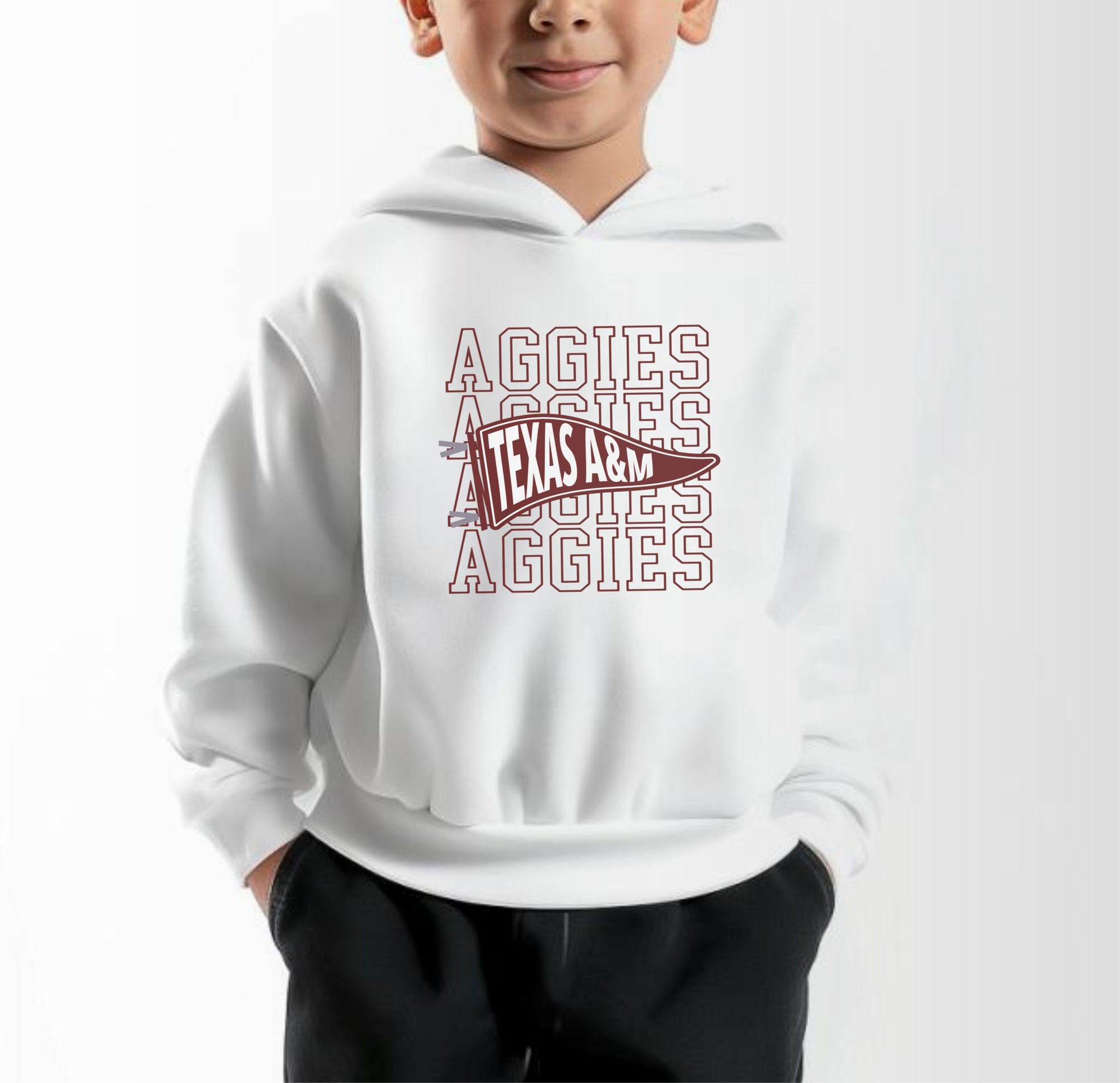 A model wears the White Toddler Unisex Texas A&M Aggies Pennant Hooded Sweatshirt.  The ﻿Texas A&M Aggies Pennant﻿ graphic is in bold Maroon in a Varsity style.