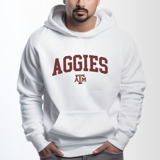 A model wears the White Adult Unisex Texas A&M Aggies Collegiate Hooded Sweatshirt.  The ﻿Texas A&M Aggies Collegiate﻿ graphic is in bold Maroon in a Varsity style.